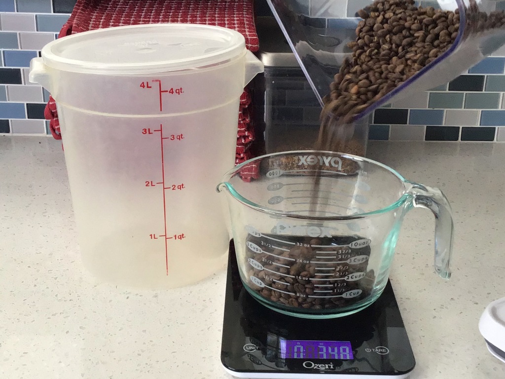 Weighing coffee beans on a scale